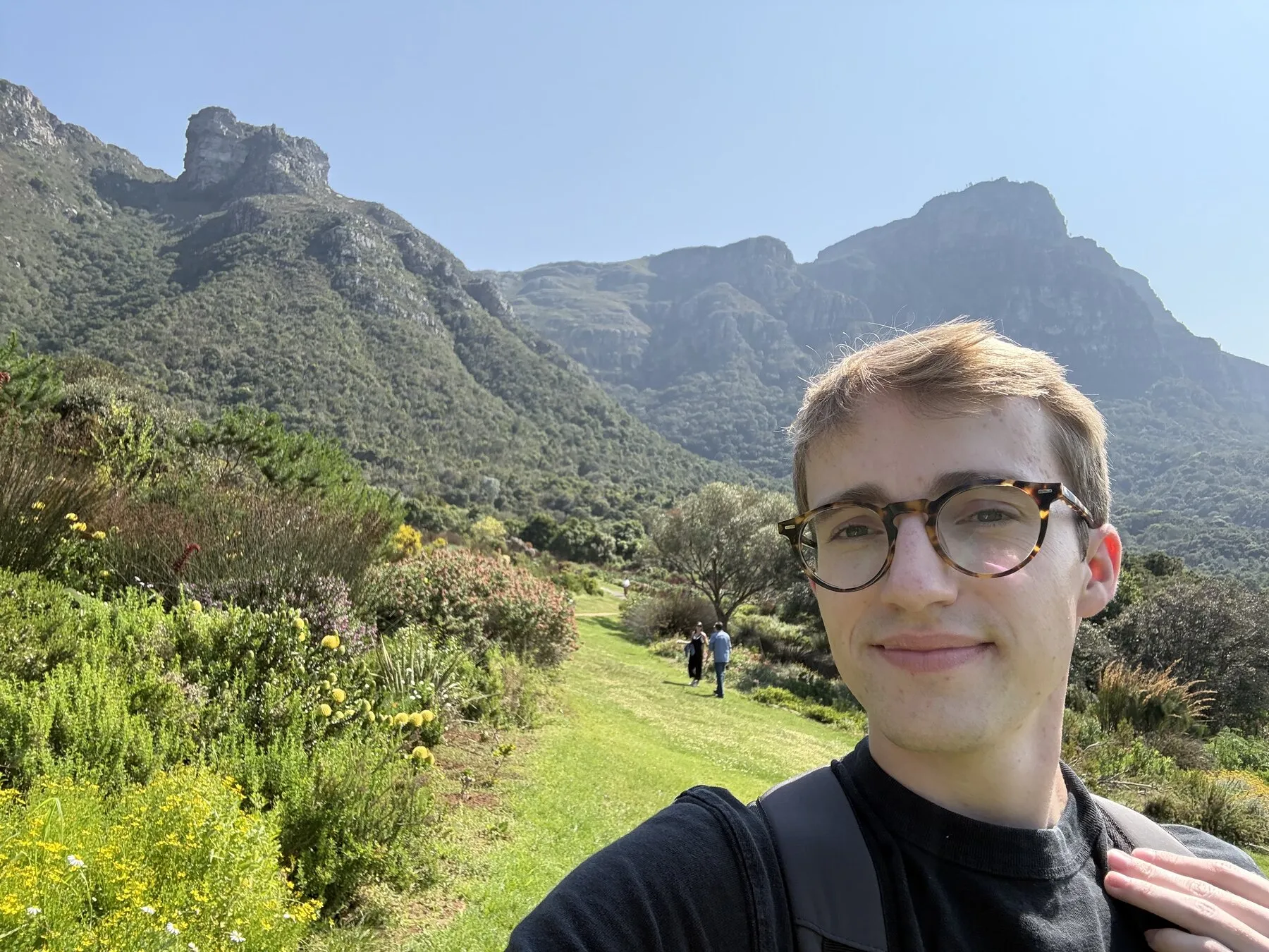 Grant at Kirstenbosch with the gardens and mountains behind him